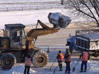 Коммунальные службы города на работах по расчистке снега