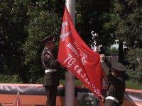 Водружение копии знамени Победы на главный флагшток Республики